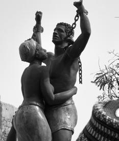 320 section E:1 43 Statue commemorating end of slavery, Goree Island, near Dakar, Senegal (Hani Serag) munity needs.
