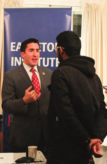 Eagleton Fellowship Alumnus and Burlington County Freeholder Ryan Peters spoke with students after the Alumni Career Panel.