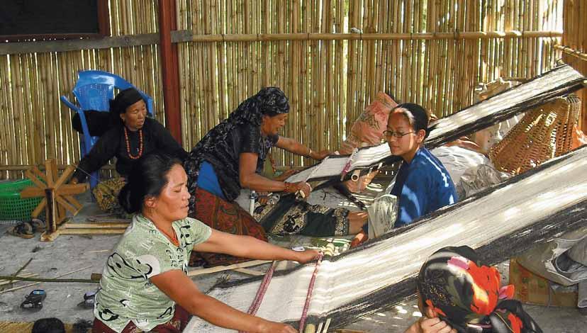Traditional occupation of carpet weaving among Gurung indigenous women, Photo: NEFIN engaging meaningfully with relevant stakeholders, including government agencies, in the REDD+ decision making