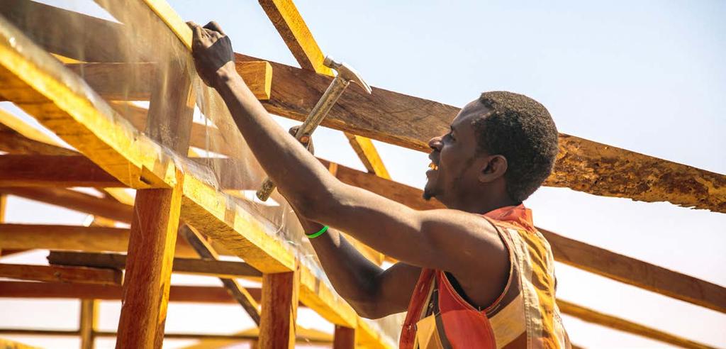 IOM Shelter and Settlements 2015 Highlights March 2016 A temporary shelter being built in Maiduguri (Nigeria), M.