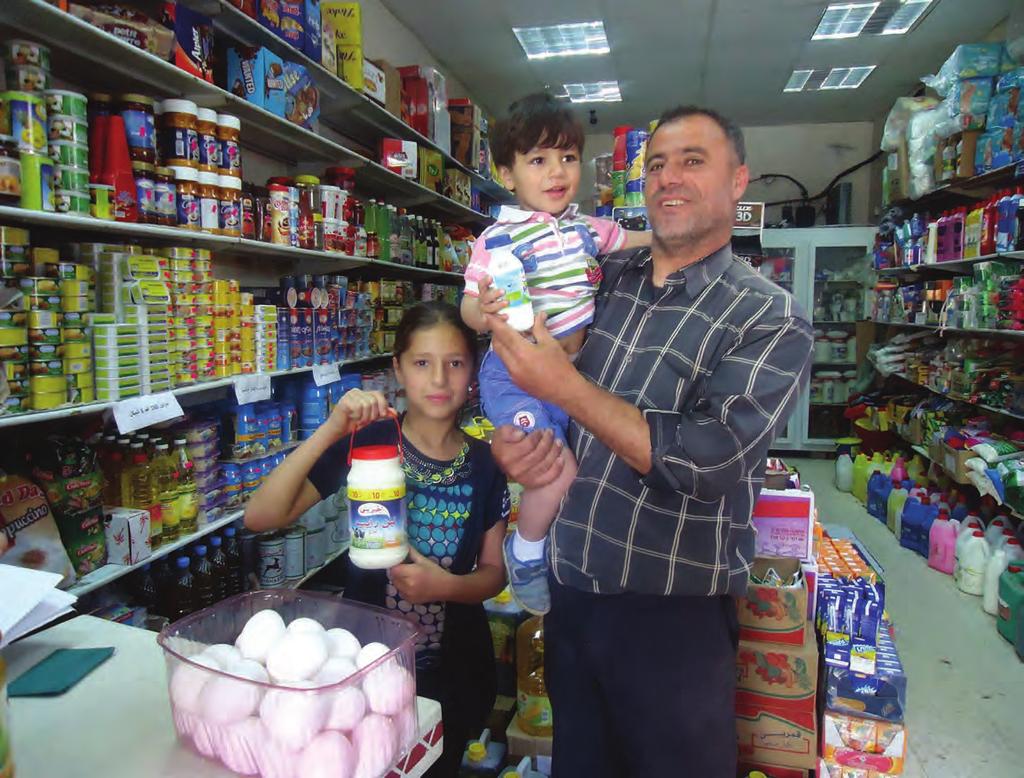 29 2016 opt emergency appeal west bank: sector-specific interventions West Bank refugee family using an electronic voucher to purchase fresh food items from their local supermarket, May 2015.