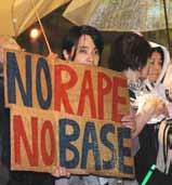 asia Protesters outside the Japanese prime minister s official residence in Tokyo on October 17 condemn the alleged rape of a woman on Okinawa by two US servicemen, who were arrested the previous day.
