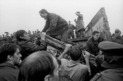 In East Germany, demands for political and economic rights increased. In November 1989, the Berlin Wall was torn down, removing the symbol of division between communism and capitalism.