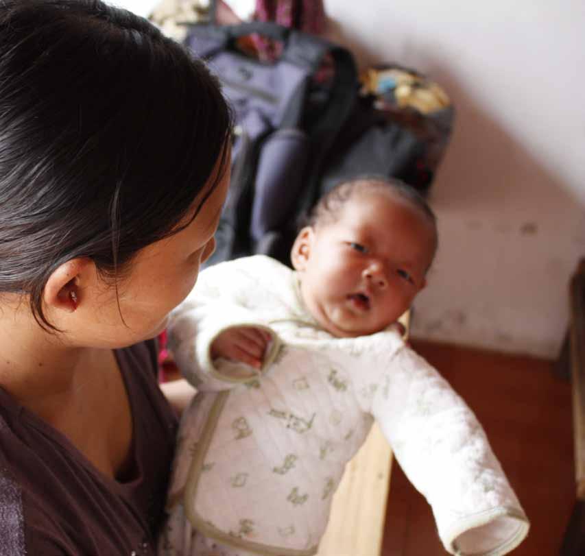 (above) Kachin refugee who gave birth in China s Yunnan Province, after being forced back to Burma by the Chinese authorities.