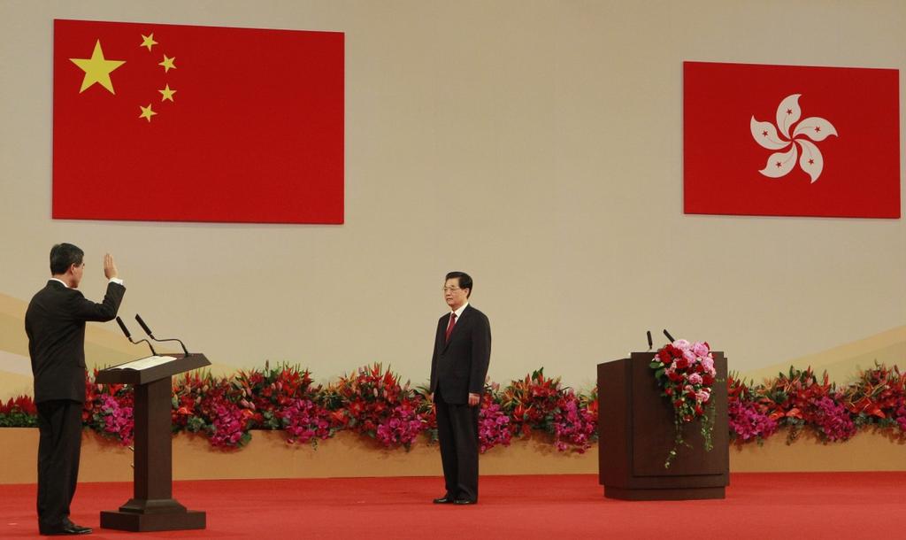32 NEWS FROM CHINA /JULY 2012 term HKSAR government, members of the Executive Council, president of the Legislative Council and chief justice of the Court of Final Appeal of Hong Kong, Hu urged them