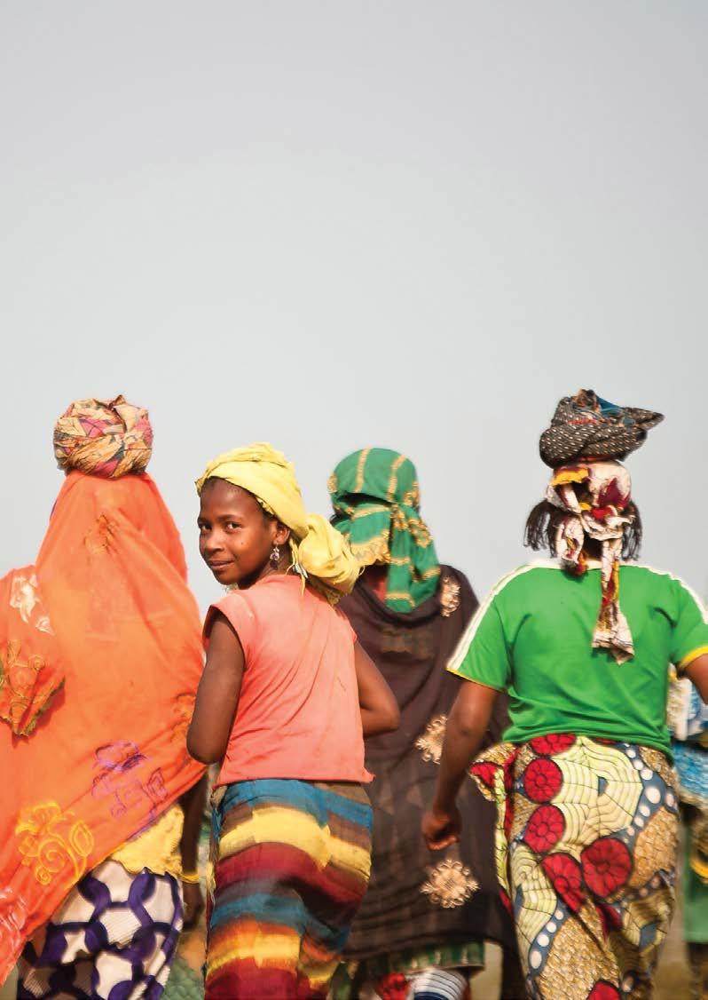 Women and girls from the Central African Republic leave in groups to gather wood an
