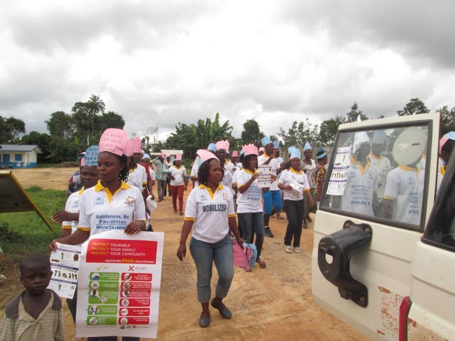 STORY: PROTECTING REFUGEES FROM EBOLA Once every week or two, a group of almost 20 volunteers parades through eastern Liberia's Bahn Refugee Camp, singing songs and carrying banners.