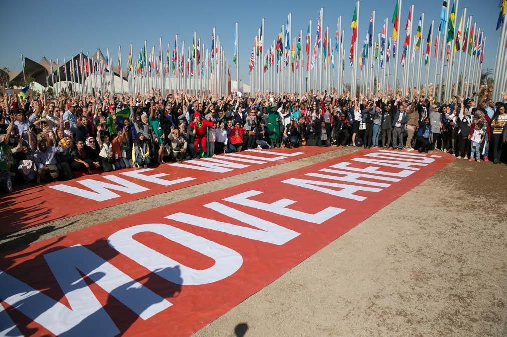 FROM BALI TO MARRAKECH: A DECADE OF INTERNATIONAL CLIMATE NEGOTIATIONS Hundreds of delegates gather for the largest-ever UNFCCC family photo in Marrakech at COP 22. Photo: IISD/Kiara Worth.