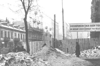 Poor conditions led to diseases like TYPHUS and TUBERCULOSIS Entrance to the Warsaw ghetto.