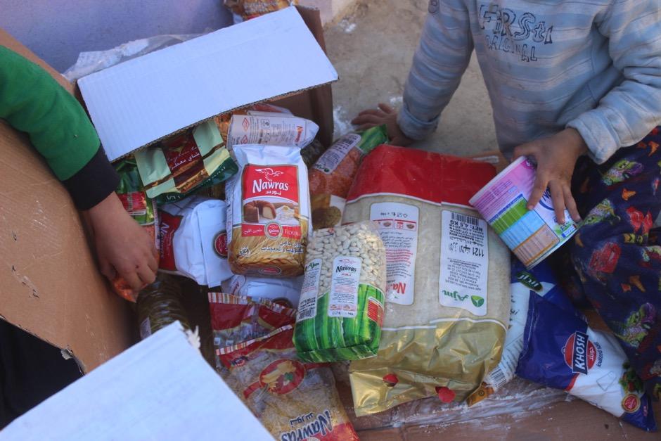 Contents of one MOMD food box. From Gogjali the four MOMD trucks drove along dirt roads on a route through Samah, across an open area and then into Arbajiyah.