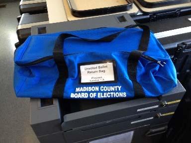Zip up the Unused Ballot Return Bag and lock with the green lock located on the Lock and Seal Storage Sheet.