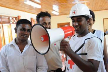 Strengthening Local Capacities and Partnerships The American Red Cross was able to respond immediately to the tsunami with funding, people and supplies, because of the strength of the global Red
