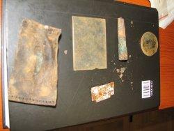 Objects retrieved during the exhumation of the mass grave in Wola Ostrowiecka conducted in