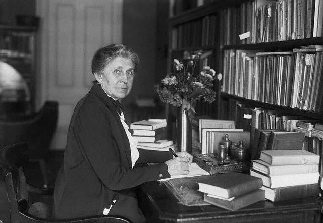 Original caption: 9/20/1921- Ida M. Tarbell at her desk.