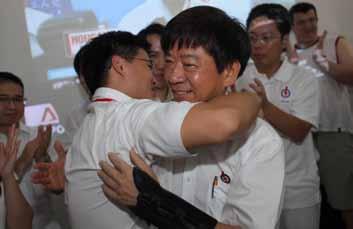 Mr Khaw Boon Wan offers a hug to Desmond Choo at the post-result session. Supporters of the Hougang Branch on polling night. Several CEC members turned up at the feedback session.
