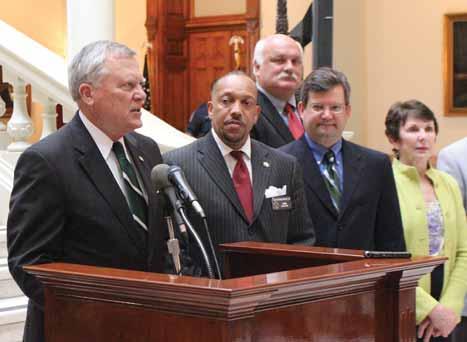 Photos provided by the Office of the Governor (Left to right) Gov. Nathan Deal; Sen. Ronald B. Ramsey Sr. (D-Decatur); Douglas County District Attorney David McDade; Sen.