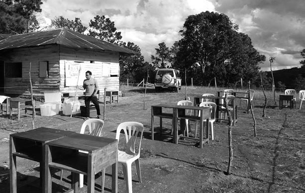 Voting, Counting, and Tabulation An outdoor polling station is set up the day before election day in Shan state.