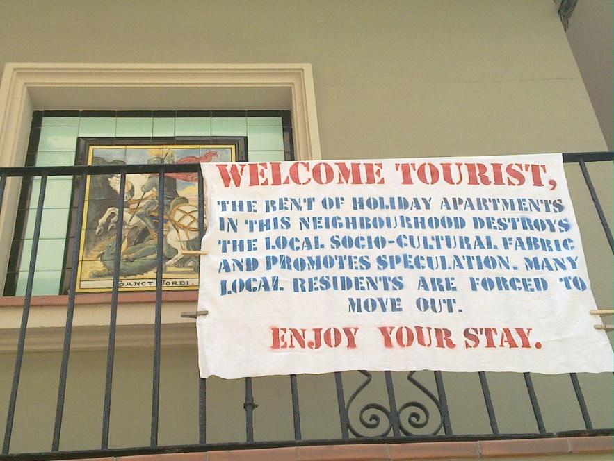 Anti-tourist banner in Barcelona Toni Hermoso Pulido/Flickr DEFINITION BACKLASH = a strong feeling among a group of