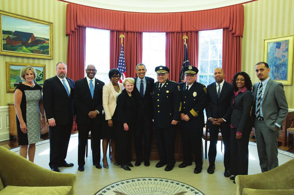 President Barack Obama joins members of the President s Task Force on 21st Century Policing for a group photo in the Oval Office, March 2, 2015.