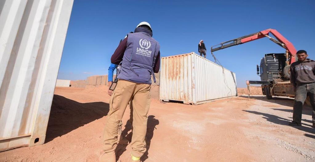 Achievements Shelter and NFIs Achievements and Impact UNHCR helps with the first delivery of aid in months to thousands of Syrians on the border UNHCR field staff working near Rukban on the