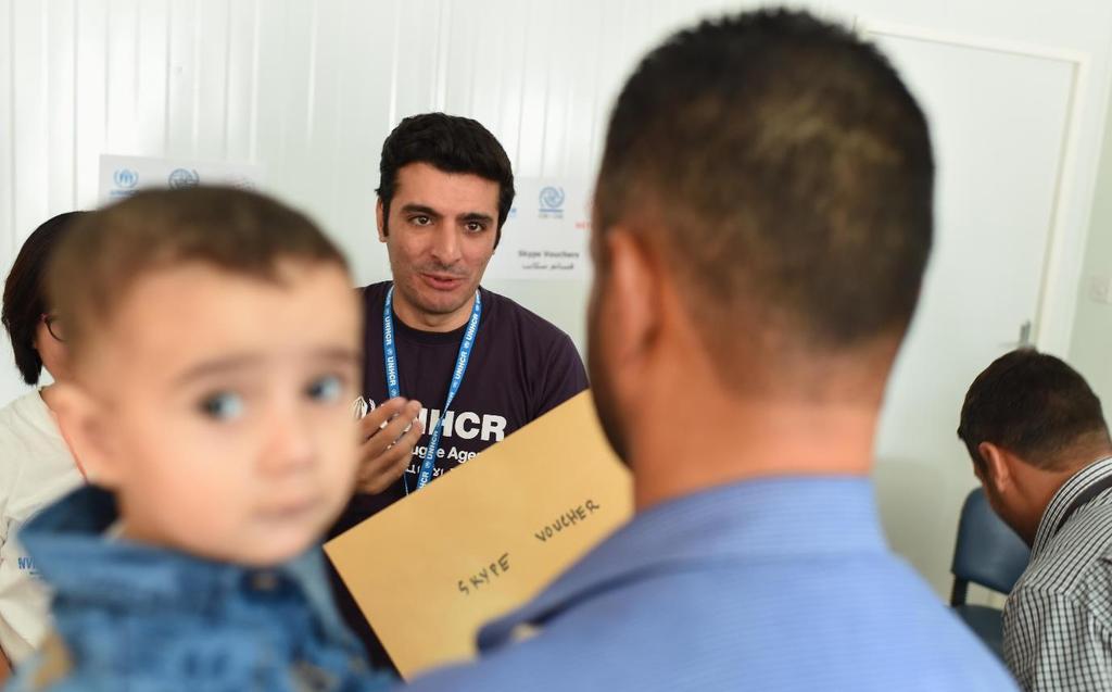 UNHCR distributes Skype vouchers to resettling refugees and others in need UNHCR Operational Update Jordan December 2016 UNHCR staff distributing Skype vouchers to Syrians refugees shortly before
