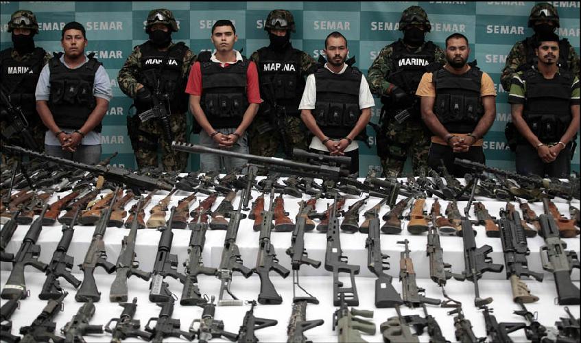Mexico City- Criminal suspects from Los Zetas OCG are presented before of the media with the over 200 rifles