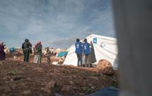 Relief. Islamic relief staff preparing tents for the newly displaced people from the city of Aleppo.