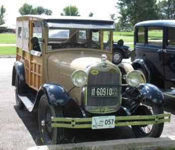 skies. Pictured above in front of the Mahoney Lodge are the 8 Model A/AA's driven to the picnic.
