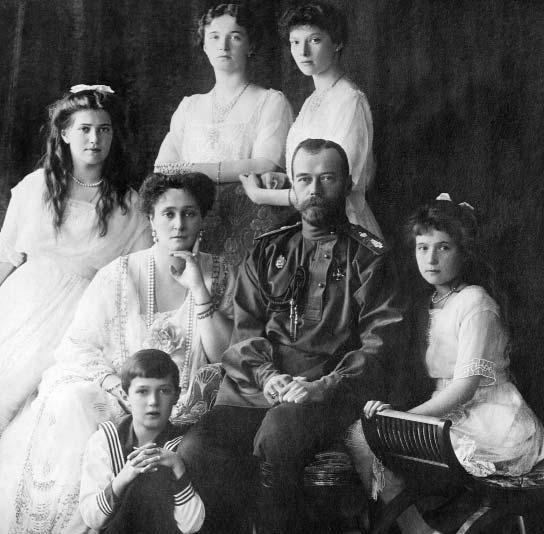 Library of Congress Tsar Nicholas II (center) with members of his family, the Romanovs, circa 1913. The tsar s suppression of political opponents and handling of World War I led to his abdication.