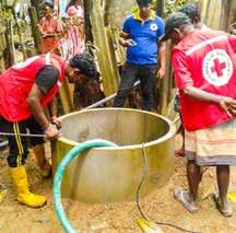 Volunteers from the Colombo branch clean wells in Hanwella. Until 1 June, they had cleaned 68 wells. Cleaning wells is necessary to avoid waterborne illnesses from contaminated water.