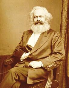 What is the government s role in a socialist system? Karl Marx is the founder of modern socialism. In the U.K., health care is largely funded by the government.