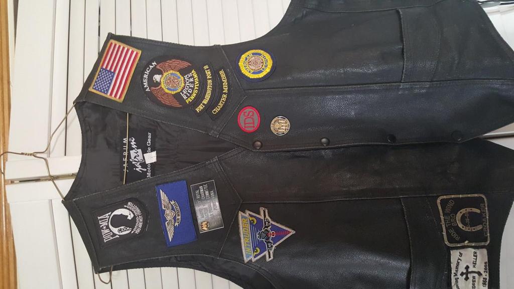 Front of Vest 1.) The American Flag shall be the highest patch on the front of the vest, as shown. 2.) The top of the POW patch shall be 1 lower than the top of the American Flag. 3.