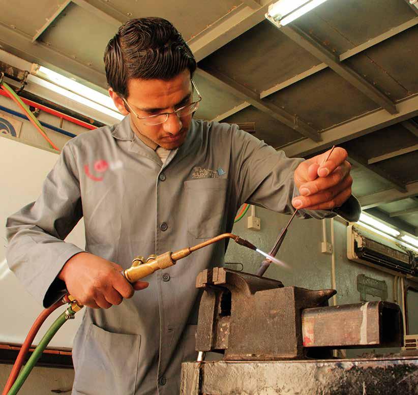 Young Jordanian Yahia receives on-the-job training as part of the UNDP s Vocational training programme on Heating, Ventilation and Air Conditioning as part of the Host Communities Project.