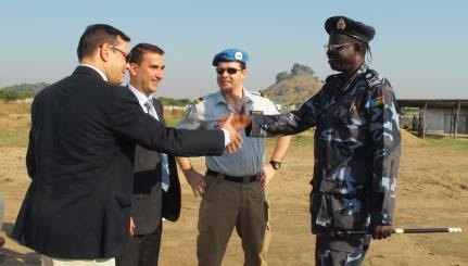 From left: Commandant Doucoure Mahamadou Sine, from National Gendarmerie, Controleur General Yacouba Tounkara, conseiller aupres du Secretaire General du Ministere de la Securite Interieure, Mr.