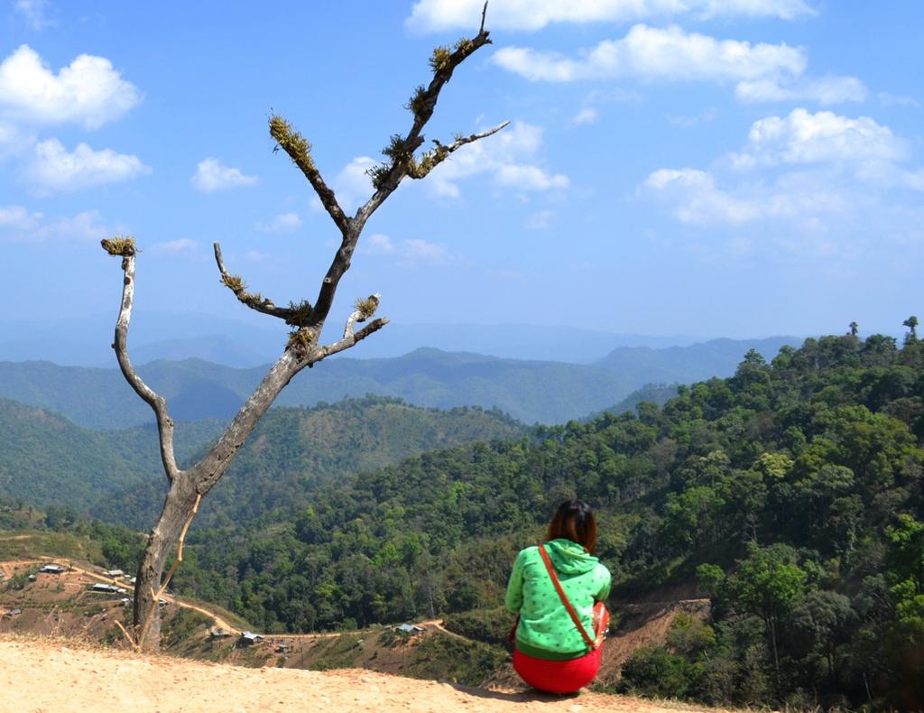 An exile in her own land; IDP looking out across Shan State