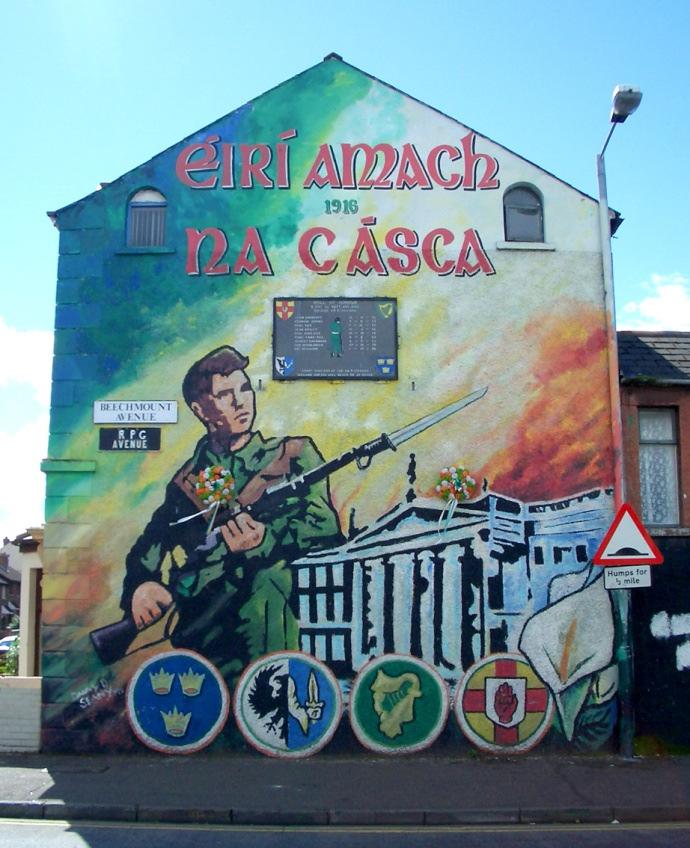 There were also murals which referred directly to the armed struggle of the IRA, with portrayals of weapons and hooded men but these never dominated imagery, unlike Loyalist murals.