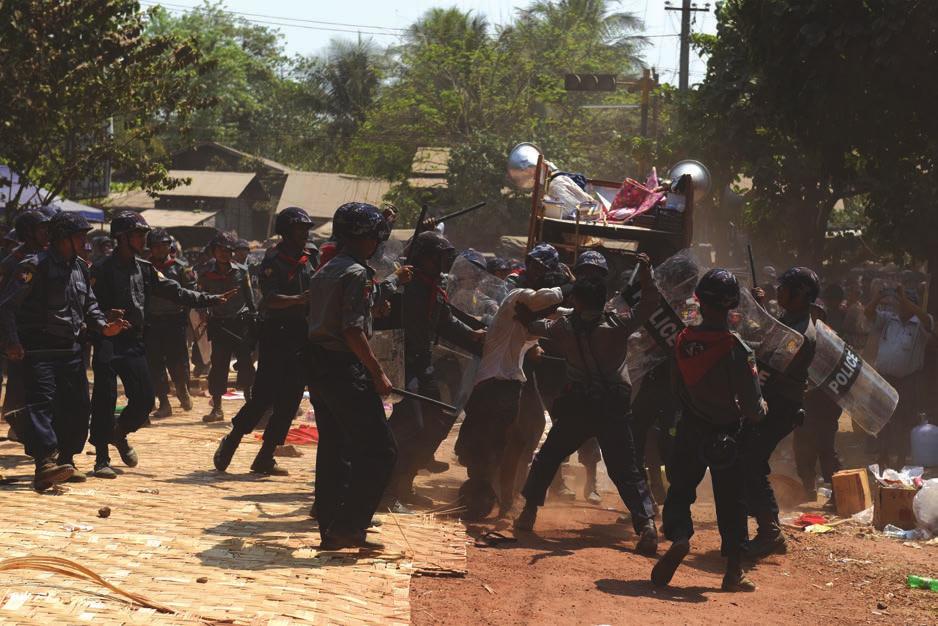 Executive Summary A student hit by police in Latpadan on 10 March 2015 Copyright: Sai Zaw / The Irrawaddy Section 1 of the Report the Introduction explains the background to the issue of HRDs in