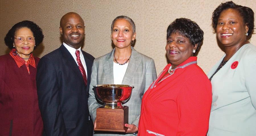 NBC-LEO President Felicia Moore, an Atlanta, Ga., city council member, far right, presented the Cultural Diversity Award to Little Rock, the winner of its population category, for WorldFest.