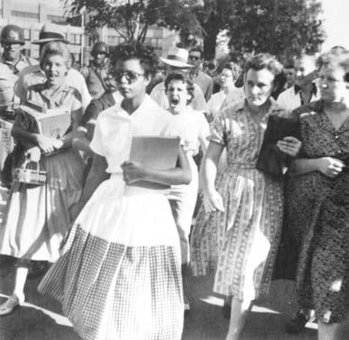 7a Based on these photographs, what happened to Elizabeth Eckford as she tried to attend Central High School on September 4, 1957? [1] Document 7b.