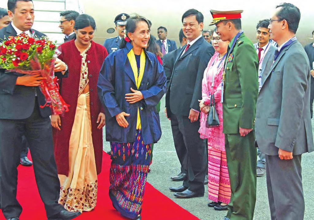 Win Myat Aye over repatriation of returnees page-3 Daw Aung San Suu Kyi arrives at the airport in New Delhi to attend the 25th ASEAN-India Commemorative Summit.