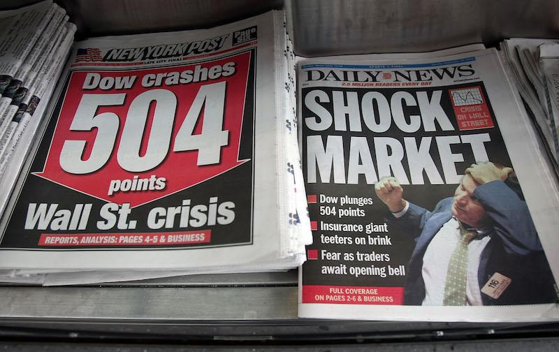 Newspapers are seen for sale at a newsstand Sept. 16, 2008 in New York City. The previous day, the Dow Jones Industrial Average plunged 4.