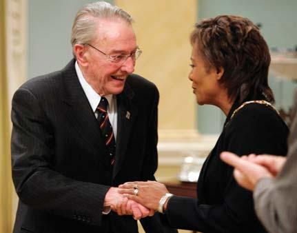 Jean-Robert Gauthier receives the Order of Canada from Governor General Michaëlle Jean in 2007. As a senator, M. Gauthier championed Francophone rights.