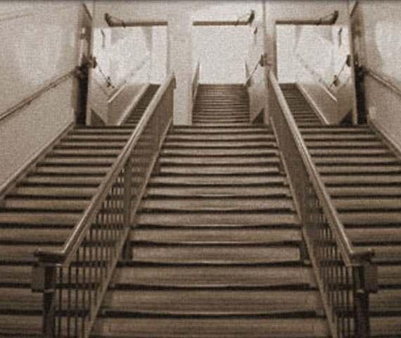 Stairs of Separation As the immigrants walked up the staircase, U.S. Health Officials watched them for signs of a number of illnesses.