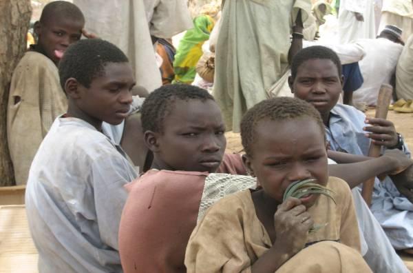 Young boys waiting for distribution of government provisions in Gassiré site, 28 April 2007 (Photo: Mpako Foaleng/IDMC) IDP sites When the displacements started, the Chadian government and
