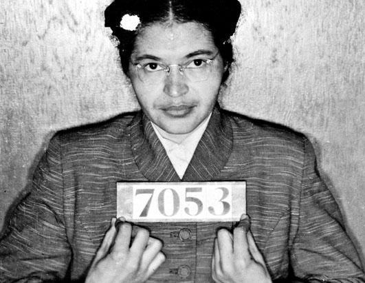 Rosa Park refuses to vacate her bus seat for a White person in Montgomery, Alabama, prompting Black and White