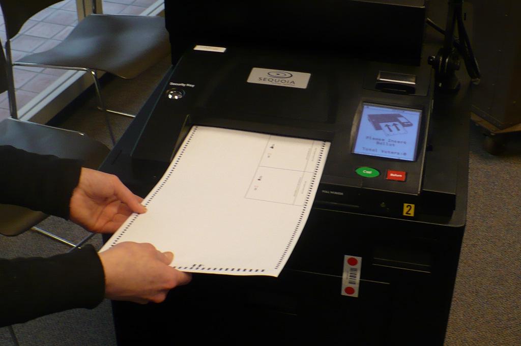 7. If there are ballot discrepancies, or the scanner can not read the ballot, the LCD screen will alert the voter to the error and/or the ballot will be returned.