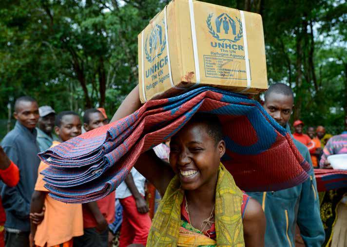 CHAPTER 2 TANZANIA. REFUGEES RELIEVED TO ESCAPE ESCALATING VIOLENCE IN BURUNDI. Refugees arrive at UNHCR s Nduta camp in the Kigoma District of Tanzania.