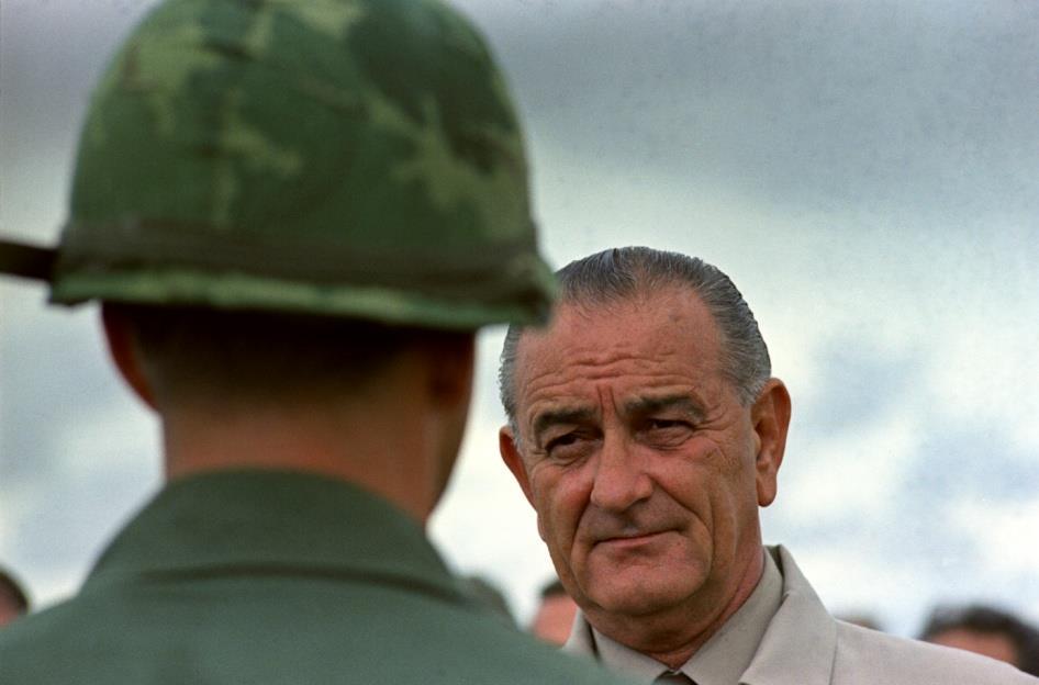 ENTER THE UNITED STATES Lyndon Johnson becomes president and declares.