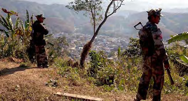 KIA soldiers guard a post on a hilltop overlooking the town of Laiza (photo: AP) The government also said the military had suffered many casualties, but did not give a number.