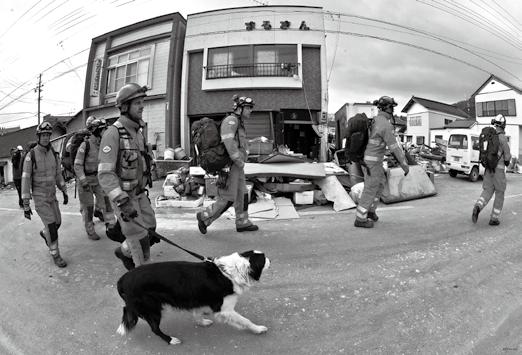 Chapter 1 The Earthquake and Japan in the World A British rescue team conducts a search in Ofunato, Iwate, on March 15, 2011 On March 11, 2011, Japan suffered an earthquake and tsunami of
